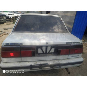 Бампер задний Toyota Corolla AE80 седан в Омске